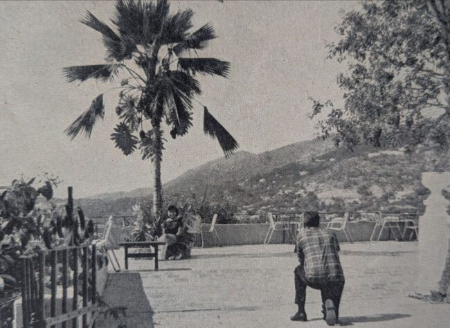 Thurgood Marshall taking a photo of Cecilia S. Marshall on the patio of Bluebeard's Castle on their honeymoon.